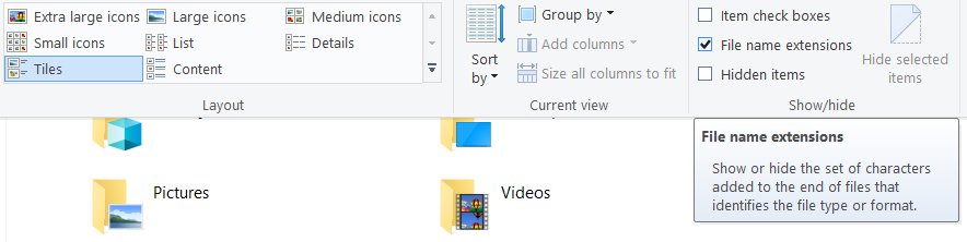 Haga clic en la pestaña Ver y marque Extensiones de nombre de archivo